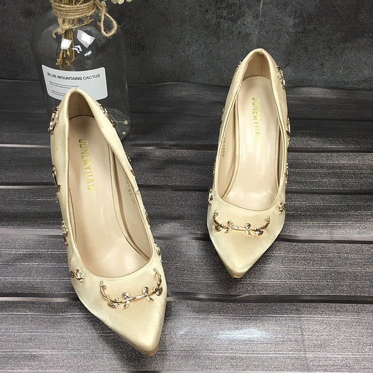 Stiletto pointed high heels